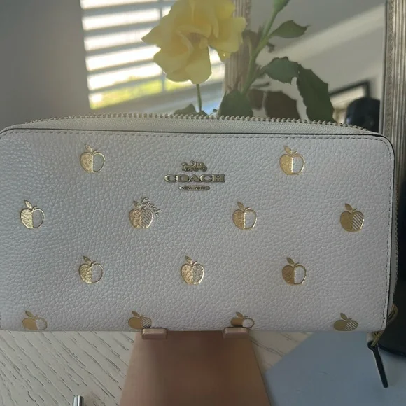 COACH- Accordion Zip Wallet with Apple Print in Gold. - Picture 1 of 6
